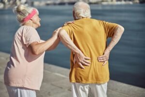 Senior Caucasian man suffering from lumbar neuralgia